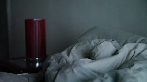 Quiet bedroom lonely red lamp Stock Footage