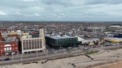 Quiet Blackpool promenade and seafront reverse reveal drone shot Stock Footage 336300493