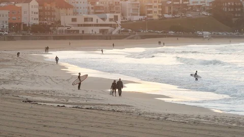 Quiet Bondi beach during winter at sunrise - slow motion 4K Stock Footage 90890574