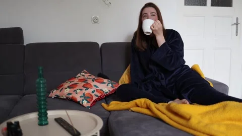 A quiet coffee break helps a tired woman recharge after waking. Stock Footage 340087827
