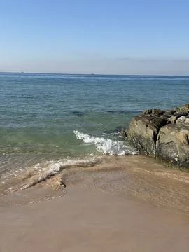 A Quiet Conversation Between Ocean and Shore Stock Photos