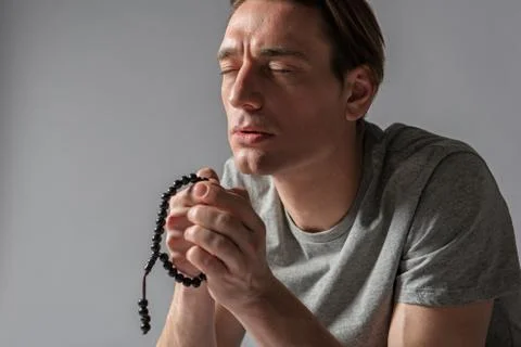 Quiet devout man focused on orison Stock Photos