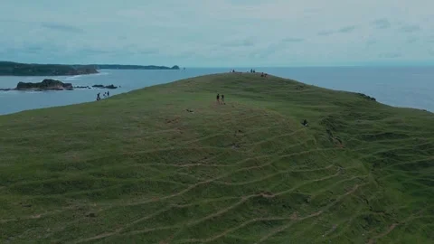 Quiet elevated area where person strolls by peaceful shoreline Stock-Footage 333526188