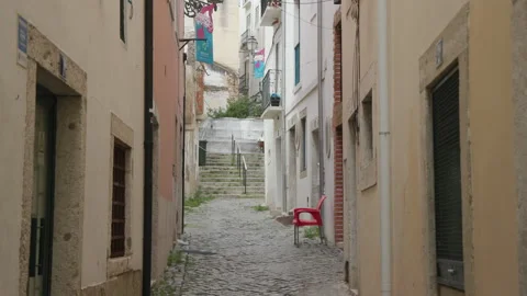 A quiet empty street in Alfama, Lisbon's oldest neighborhood. Taken during Video stock 201640301