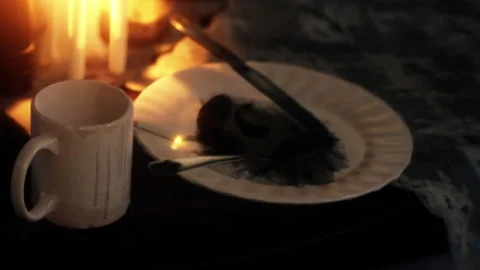 Quiet Evening With Remnants of a Cozy Dinner and Gentle Candlelight Stock Footage 346691809