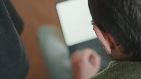 Quiet indoor environment with focused student at work. Closeup of student Stock Footage 338438625