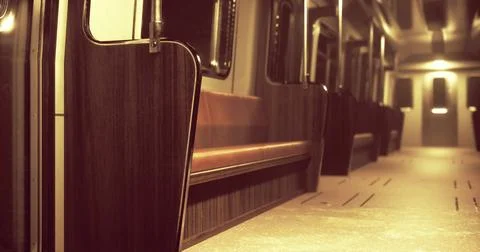 Quiet interior of a retro subway train with wooden benches and warm lighting 스톡 일러스트