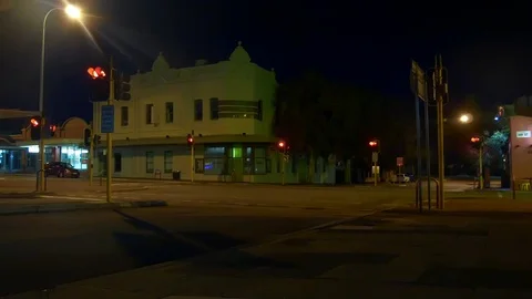 Quiet intersection at night in the city Stock Footage 91607325
