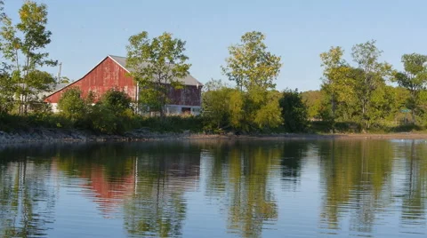 Quiet lake with a barn Stock-Footage 68933411