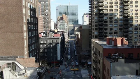 Quiet Manhattan Side Street Between Brick Apartment Blocks Vídeo Stock 126896775