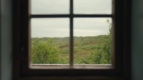 Quiet Mountain Landscape Seen Through Rustic Window in a Calm Rural Interior Stock Footage 338182039