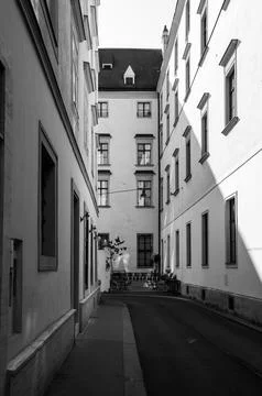 Quiet path between the buildings. Stock Photos