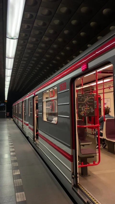 Quiet platform with paused train. An abandoned metro platform at night Stock Footage 335368360