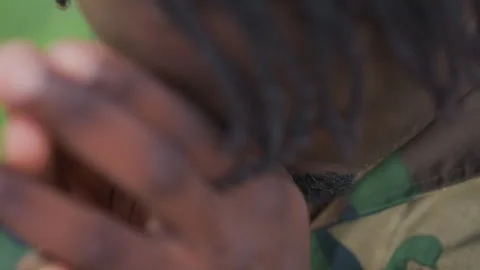 Quiet Prayer Scene, Intimate Image Of Soldier Seeking Peace Through Prayer Stock Footage 324758938