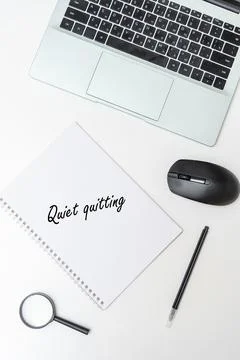 Quiet quitting work time is out, get up and go, do nothing beyond job duties Stock Photos