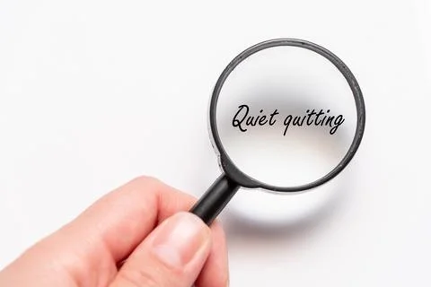 Quiet quitting work time is out, get up and go, do nothing beyond job duties Stock Photos