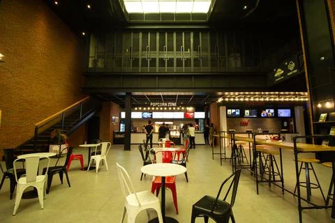 Quiet Restaurant Interior With Empty Tables at Night Photos