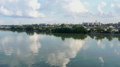 Quiet river Dnieper. Clouds in the summer over the water. Stock Footage 133410388