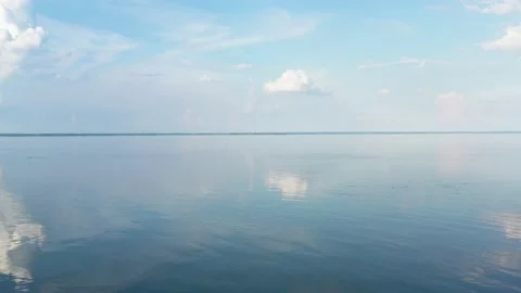 Quiet river Dnieper. Clouds in the summer over the water. Stock Footage 133410559