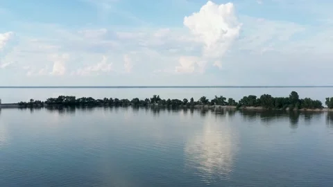 Quiet river Dnieper. Clouds in the summer over the water. Stock Footage 133410645