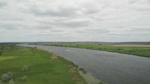 Quiet River Landscape with Cloudy Sky Stock Footage 130891853