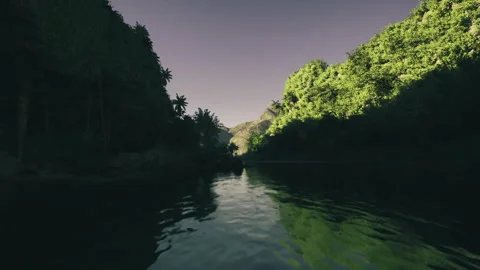 Quiet river meanders calmly under tender light encouraging reflection Stock Footage 339793954
