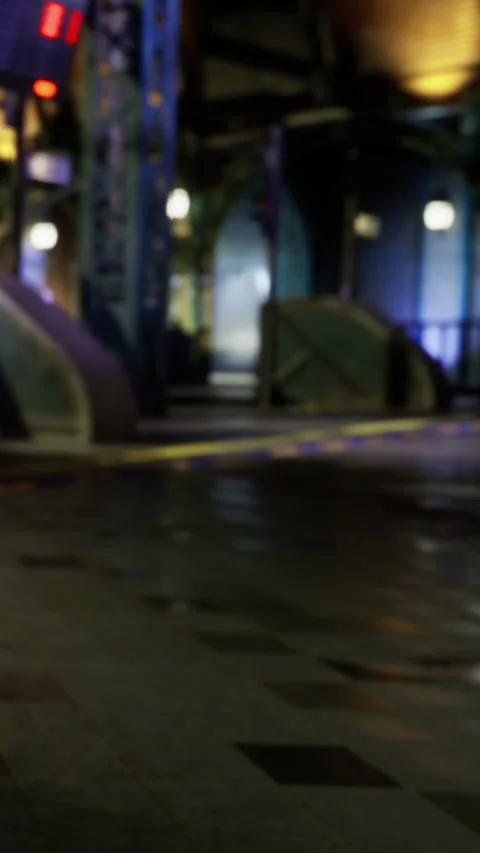 Quiet scene of the empty train station at night with reflections on the floor Stock Footage 334171482