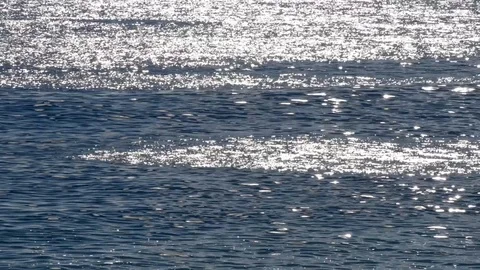 The quiet sea of spring with the reflections of the sun Stock Footage 97777237