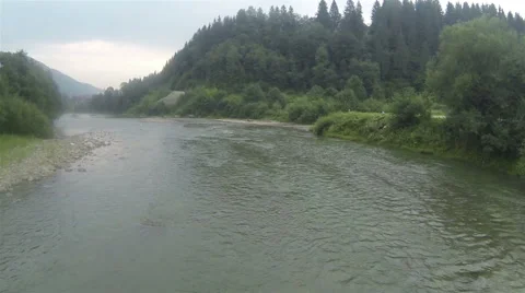  quiet  small mountain river  in cloudy day .Aerial  Stockbeeldmateriaal 42687742