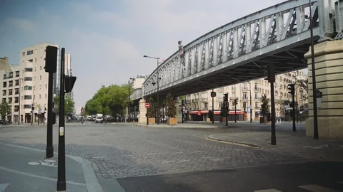 Quiet street near Eiffel tower during coronavirus lockdown in Paris Stock Footage 128385841