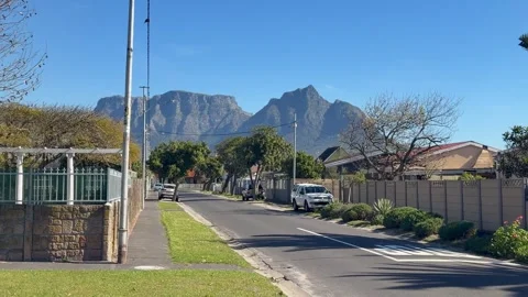 Quiet Suburban Street with Table Mountain Backdrop, Cape Town, South Africa Stock Footage 341875844