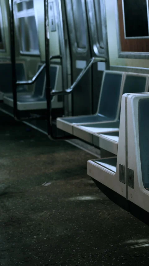 Quiet subway interior with empty seats and clean floor in urban setting Stock Footage 339404542