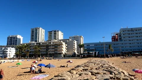 Quiet Summer Day on the Secluded Beach of Monte Gordo, Portugal Stock Footage 284768086