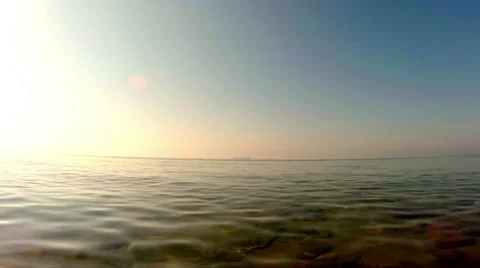 Quiet sunset on the sea shoal, clear waters and clear skies Stock Footage 42628853