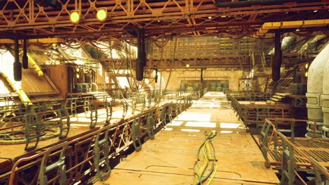 Quiet vessel engine area with glowing amber light and sooty valves Stock Footage 341562352