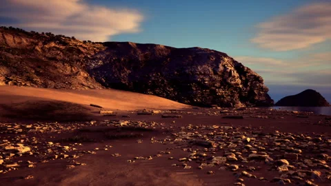 Quiet wilderness at dusk with waves and textured stones visible Stock Footage 335594382