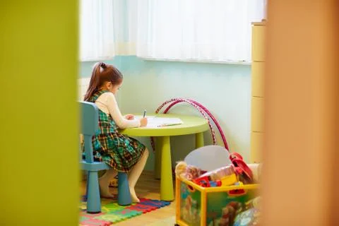 Quietly working on her creativity Stock Photos