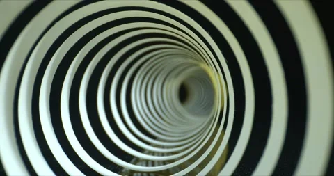 Quilling paper strips. Close-up backward slide shot inside spiral paper tape Stock Footage 143377431