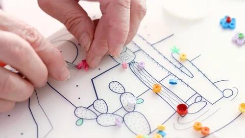 Quilling technique. Making decorations or greeting card. Handmade crafts on h Stock Footage 128255098