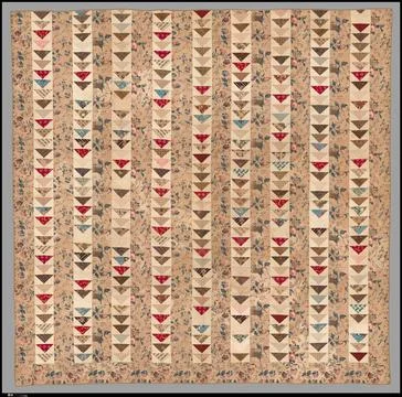 Quilt, Flying Geese pattern ca. 184050 American The top has pieced rows alt.. Stock Photos