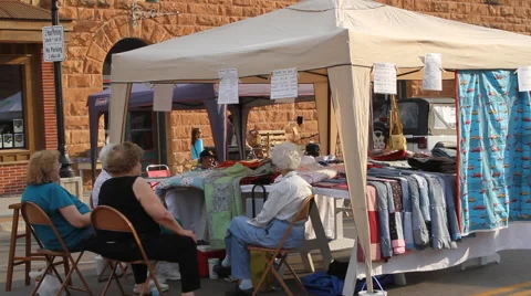 Quilts being displayed at a fair Stock Footage 40313817