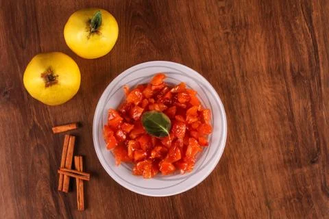 Quince jam on the plate. Stock Photos