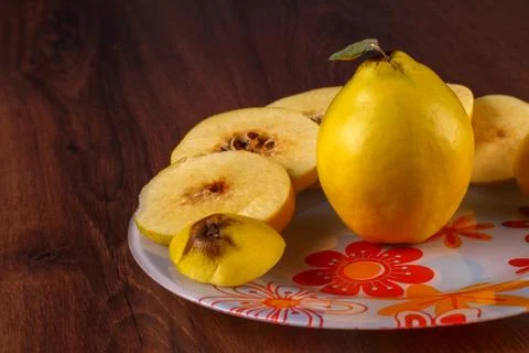 Quince on the plate Stock Photos