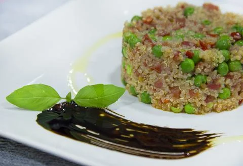Quinoa with baked vegetables Stock Photos