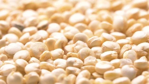 Quinoa Close Up Spin . A filled macro view of uncooked raw quinoa low angle Stock Footage 83883663