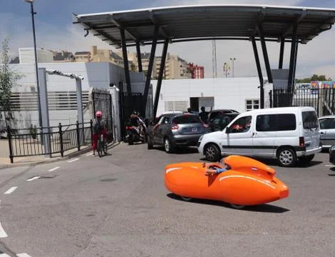 Quirky orange car in a queue Stock Photos