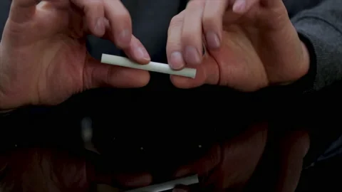 Quitting smoking breaking cigarette in half. Stopping a bad toxic habit of nicot Stock Footage 168155889