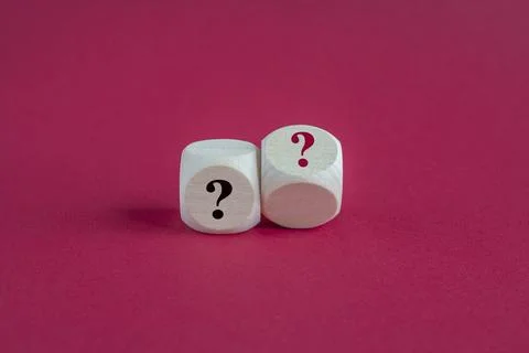 Quiz concept symbol with question mark on wooden cubes. Stock Photos