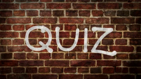 Quiz spray painted on the brick wall Video stock 231307280