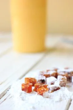Qunce paste on sugar powder Stock Photos